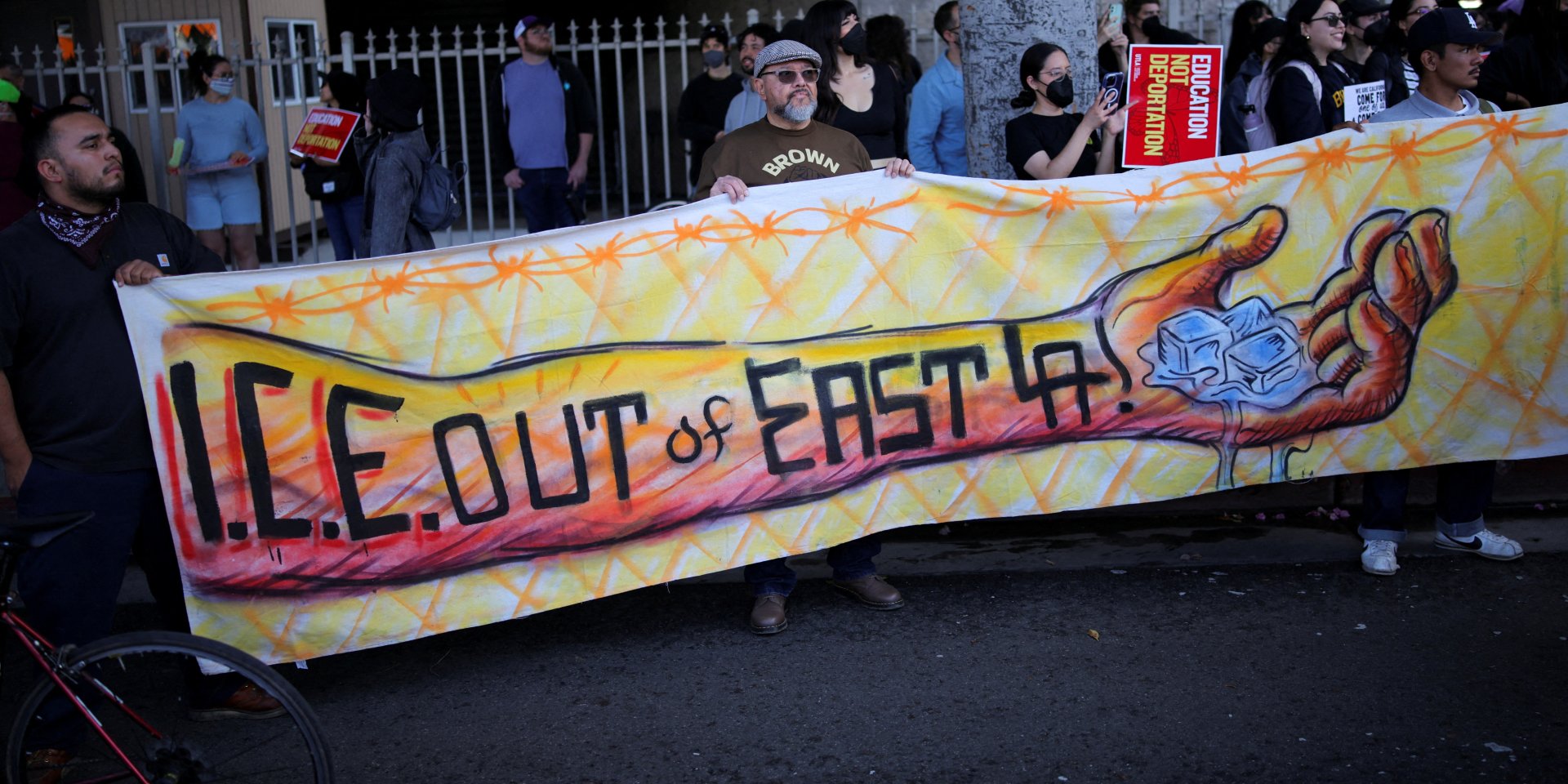 Protesters hold a banner as they gather around the Los Angeles Federal Building following multiple detentions by Immigration and Customs Enforcement (ICE), in downtown Los Angeles, California, U.S., June 6, 2025. (Photo: REUTERS/Daniel Cole)